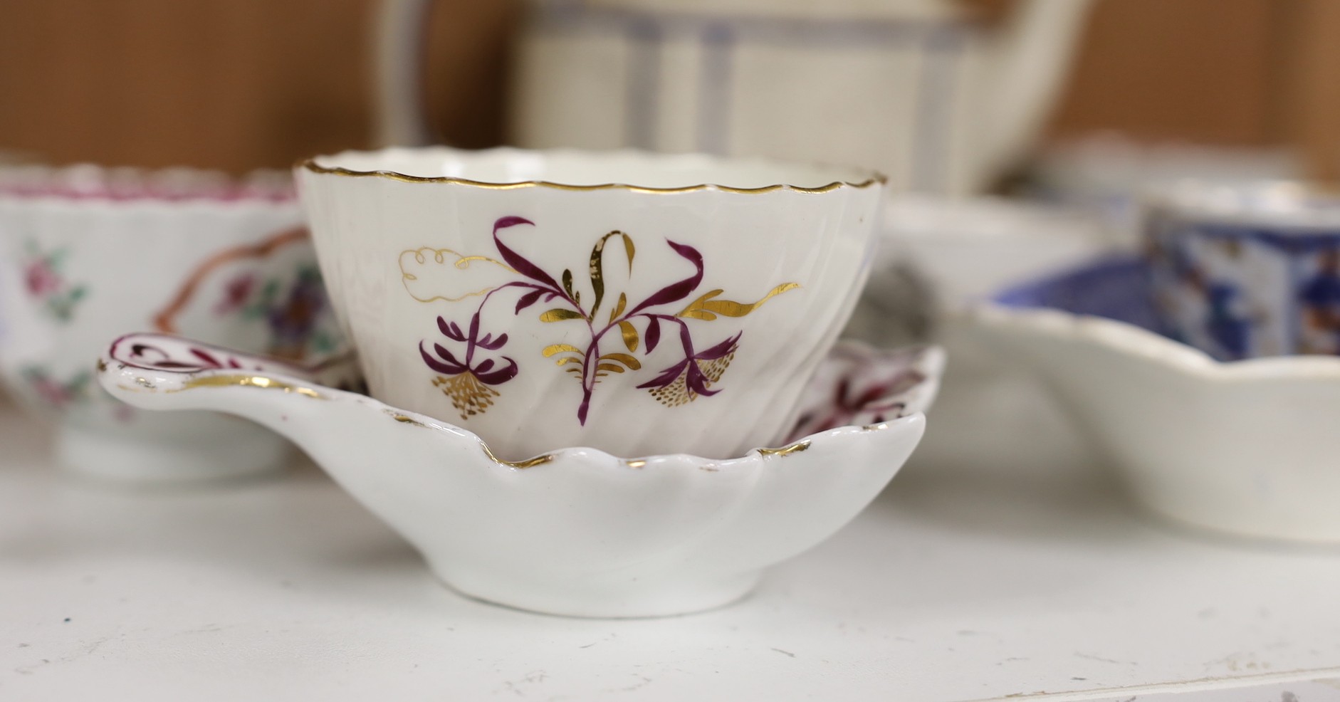 A selection of 18th century and later English porcelain tea bowls, a pair of Spode pickle dishes, and a teapot, 15cm tall